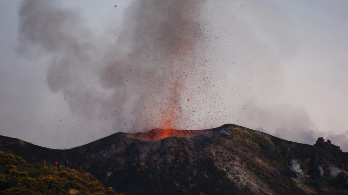 A Strombolian explosion throwing ash over the crater rim of the Stromboli volcano, Aeolian Islands, Italy