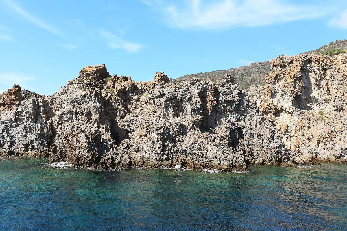 Rocky coastline of Panarea island with clear water on the Aeolian crossing, Italy
