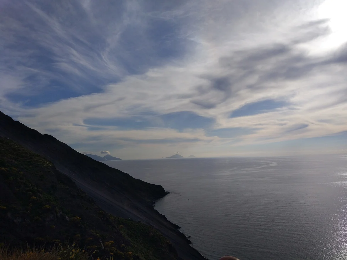 The black scree funnel of the Sciara del Fuoco on the Stromboli volcano seen from the guided trail, Aeolian Islands, Italy